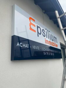 Enseigne et Vitrophanie - Enseigne drapeau ajouré Epsilium immobilier