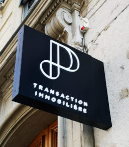 Enseigne et Vitrophanie - Caisson Lumineux Transaction Immobilière